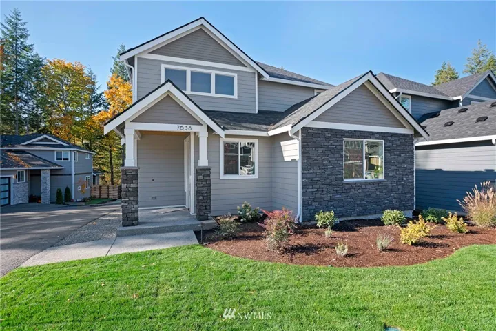 Newly completed and ready for you to call home for the holidays, the Winston was designed for multi-generational living with a mini-master suite on the main floor!