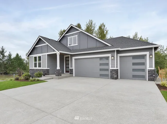 The Forte Plan by Garrette Custom Homes on Corner Lot.