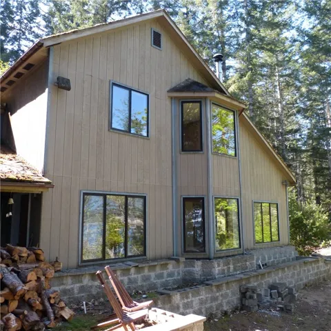 Can you see the view from both levels of this view home high on a bluff overlooking the mouth of the Duckabush in the Hood Canal.  Enjoy the sunsets across the Olympic Mountains.  Your hideaway in the Great Kitsap Peninsula.
