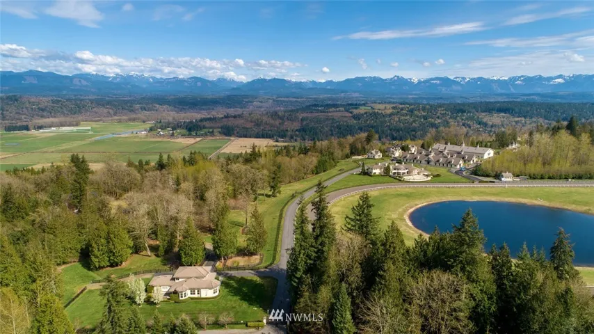 Aerial view from over the property looking east toward Pegasus Ranch and Cascades