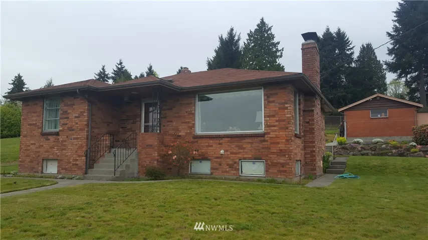 unique brick pattern on this well-kept home....
