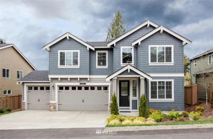 315 Ashbury Court 3 car garage and extra parking in the driveway