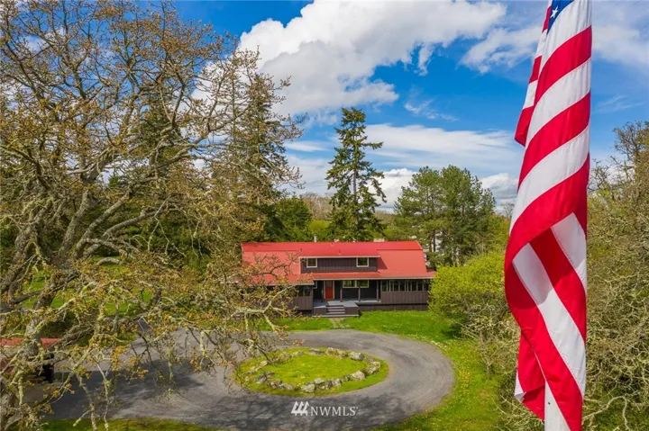 Towering oaks and a 19 tree orchard surround the property.