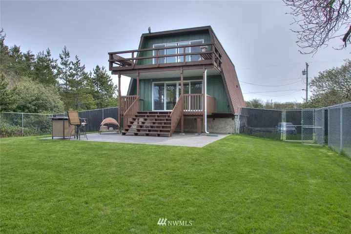 Huge Glass Sliding Doors Facing the Fenced Back Yard