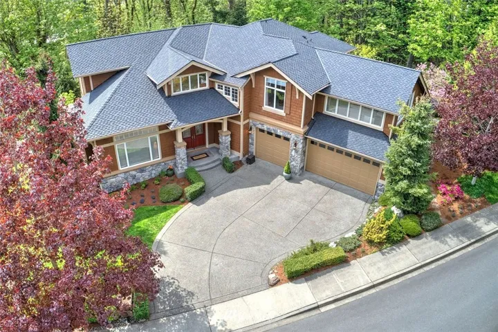 Sophisticated Craftsman in Outlook Pointe, an enclave of 12 Lockwood-Lozier luxury homes in gated community surrounded by lush landscaping and open space.