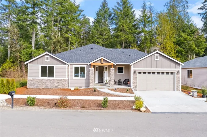 Move-in ready! Make your dream home a reality at The Greens, a quiet 22-lot gated community minutes from shopping, dining, and the historic harbor.