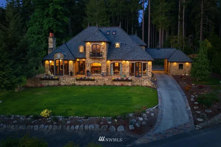 Uniquely stunning, and finely crafted with layers of richly textured finishes, this sophisticated country manor is a true masterpiece.