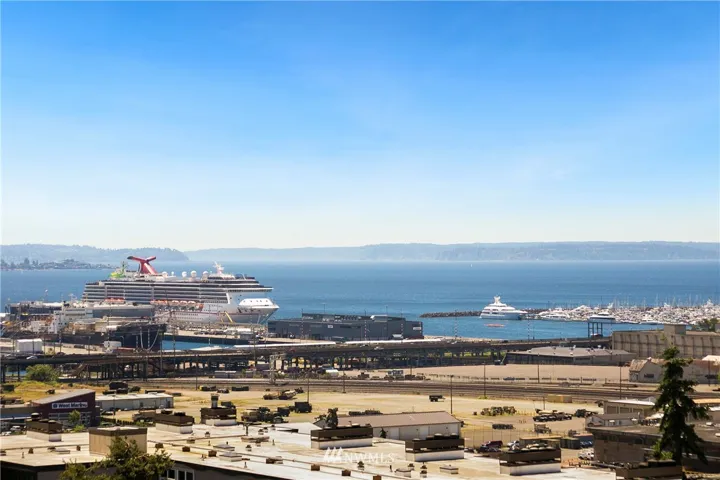 Wake up and feel like you are on vacation every day with 270 degree views of glorious Elliott Bay!