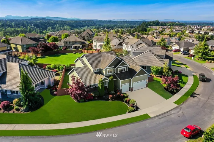 Plenty of parking in the 3 car garage, driveway and off street. Feel secure in this private gated community.