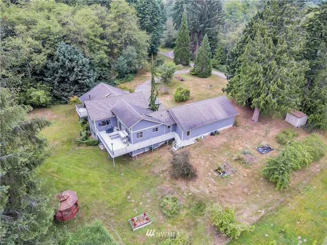 Spacious Custom Built home with freshly painted Sun Decks- Deck off both Master Bedroom and Kitchen that lives like another room- don't miss the Sun Shade that comes out above porch swing! Bird watch, sun bath, and soak in soothing sounds of nature! 750 feet of creek front footage!