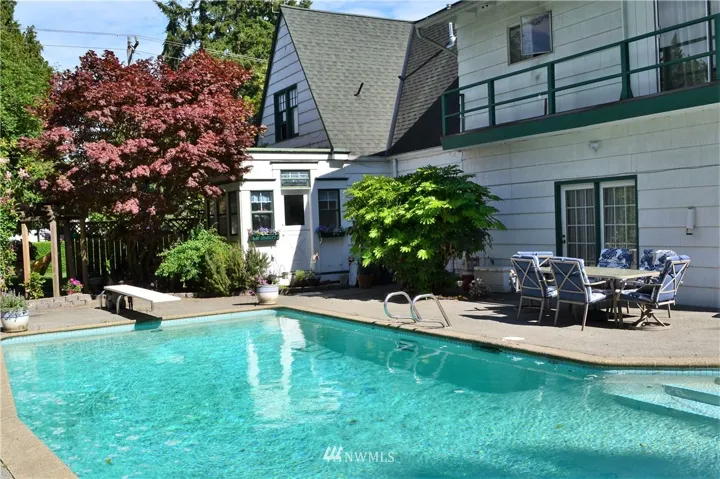 Tudor on full acre of land - zoned for 6 lots. Rare opportunity!