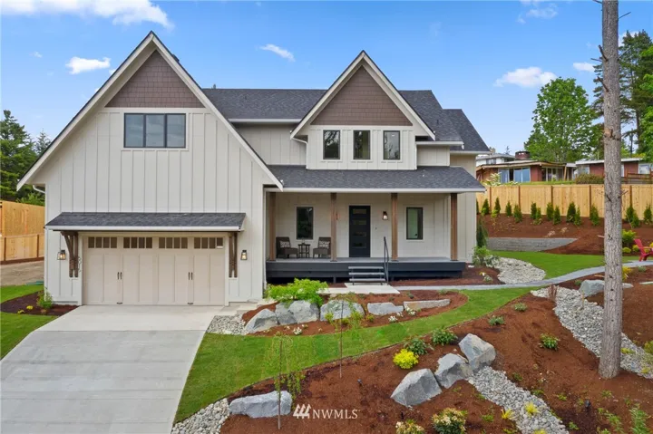 Immaculate landscaping and charming curb appeal abounds at this brand new transitional farmhouse, perched above Wollochet Bay and located just minutes to Uptown shopping, schools, and Hwy 16!