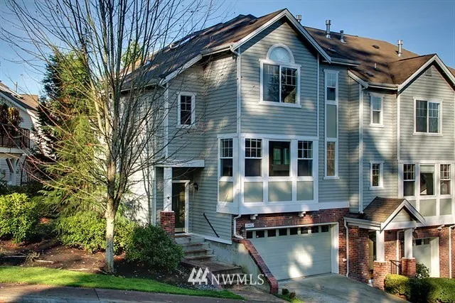 Desirable Hawthorne Estates Community.  Updated, bright, end unit, approx 1,865 sq. ft. of living space, private setting, facing green space & playground.  Open floor plan, combined dining & living room with gas double sided fireplace.  Well appointed eat-in kitchen, newer appliances, pantry & slider to patio. Vaulted ceiling in master bedroom, luxurious bath en-suite, walk-in closet & built-ins.  Convenient upper level laundry room.  Finished lower level, perfect for media, playroom, gym, or home office. Total of 3 bedrooms, 2.25 baths, 2 car garage. Ideal location, trails, near all amenities, casual & good dining, great shopping, entertainment, library, Burke Gilman Trail, Tolt Pipeline Trail & Evergreen Hospital.  Located in the Northshore School District, near University of Washington Bothell Campus, Cascadia Community College.  Easy access to highways for a decent commute to Eastside Business Core & Seattle to major employment centers such as Microsoft, Google, Boeing ect...