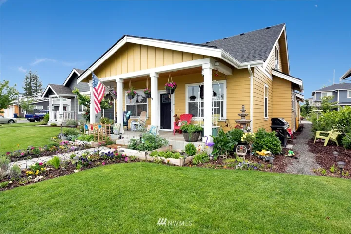Front view with mature garden