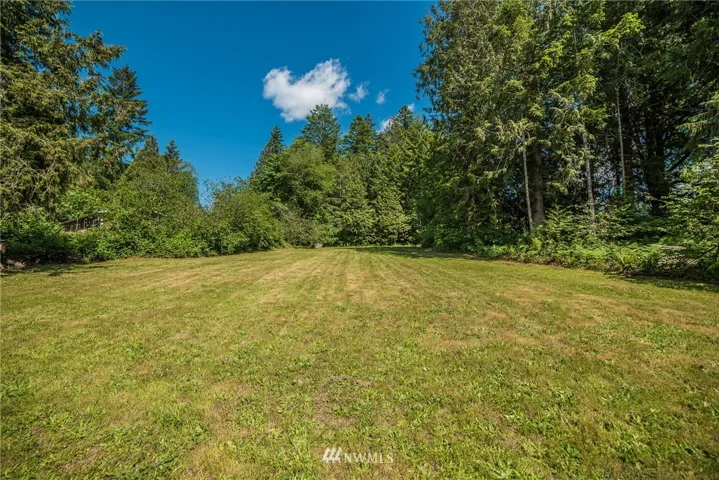 Excellent building lot AVAILABLE NOW! Power and Water in the street. Light slope but mostly level. Great place to build your new home!