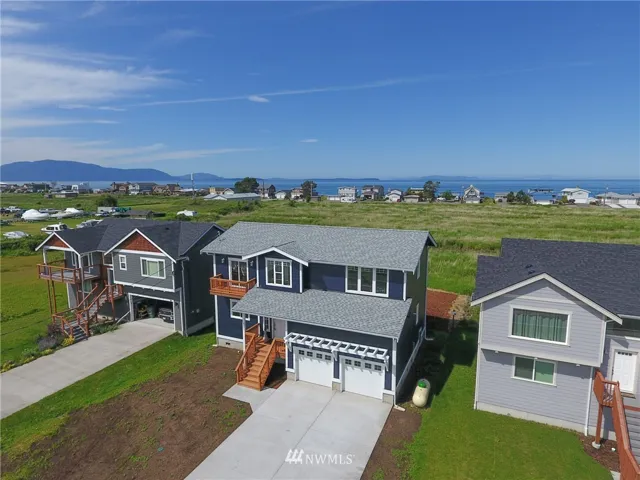 Brand new construction - looking west are the San Juan Islands and amazing sunsets over the Strait of Georgia.