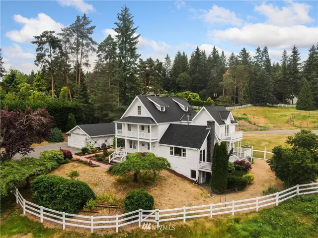 A dreamy vintage farmhouse atop Hollywood Hill on 4 lush acres.