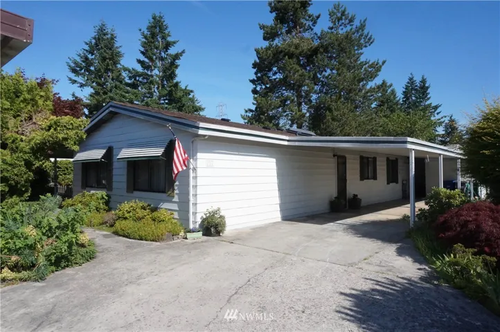 the long driveway sets this home back from the cul de sac - means added privacy.