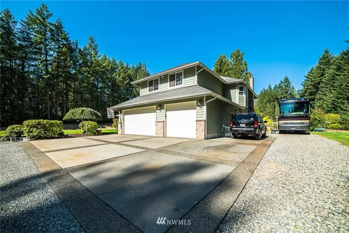 3 Car Attached garage with Plenty of storage for an RV