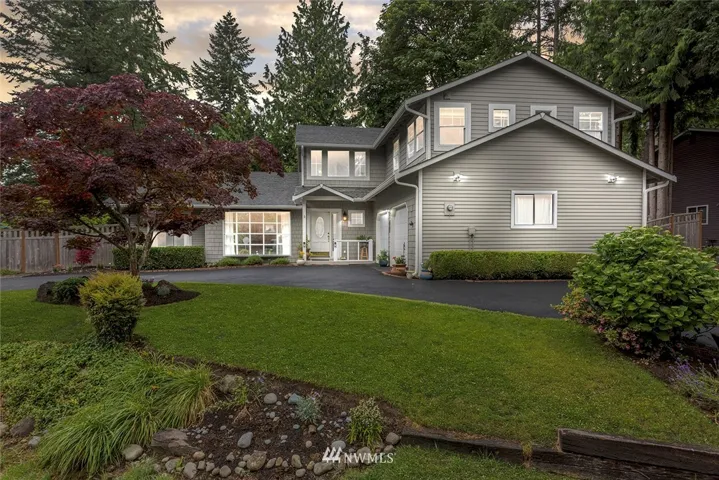 Large corner lot with circular driveway, Lots of privacy. Mature Landscaping.