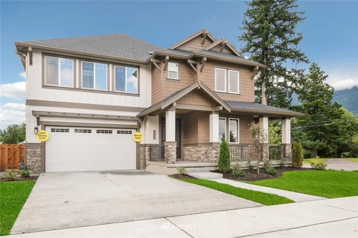 Actual home - Gorgeous corner lot with large wrapped porch.  View of Mt Si from the entire front of the home, bonus room and bdrm. View of Rattlesnake Ridge on the corner/porch side.  Rear yard has views of Rattelsnake and Mt. Washington.  Breathtaking home and views - Gorgeous upgrades throughout and ready now!