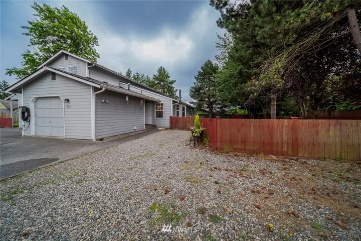 Great starter with 1-car garage and extra parking at the end of a dead-end street.  This condo lives like a single-family home, with a huge, fenced yard.