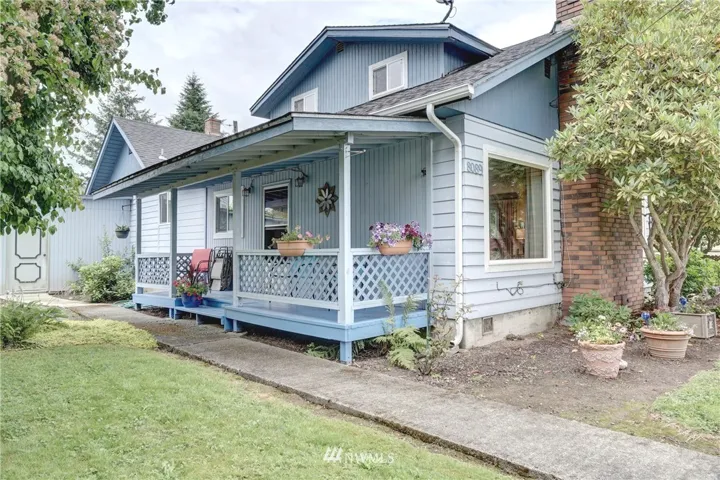 Welcome Home And Love the Covered Front Porch.