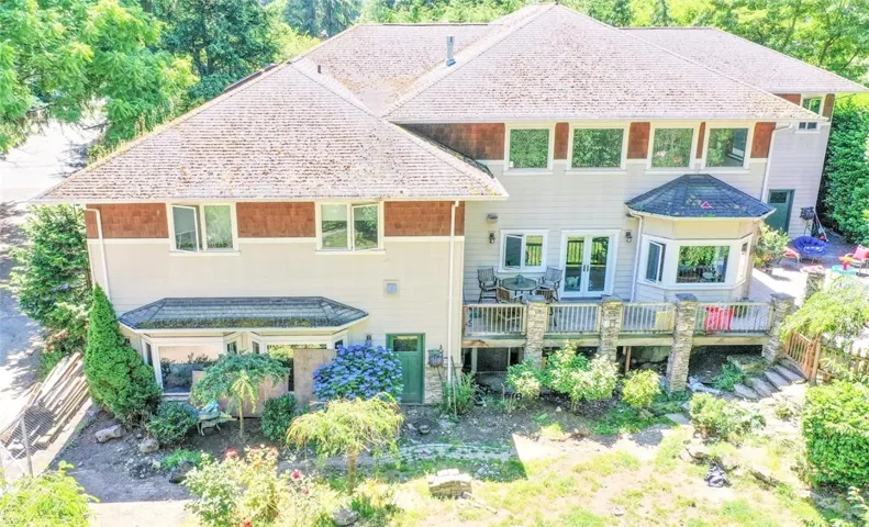 Property is located on a tree-lined street and completely private from the road and neighboring homes.