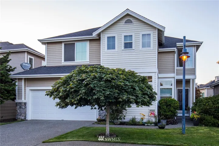 Welcome to this beautiful home in Lakeside at Cypress Cove in The Lakes in Kent with attached 2-car garage.