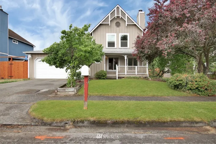 Welcome to this lovely NE Tacoma Home! Seller installed a new garage door less than 2 yrs ago.
