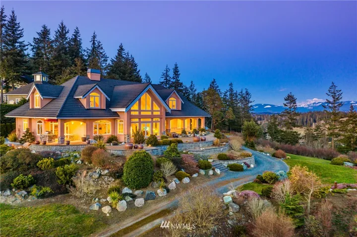 Welcome to 8664 Southridge Place. Endless style and beauty provide the best of island living can be enjoyed from this custom contemporary architectural home in Anacortes, WA featured on the MONA Home Tour.