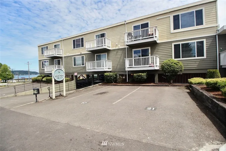Only 16 units in this one of a kind Condominium right across from Pt Defiance Park. See the water view off to the left.