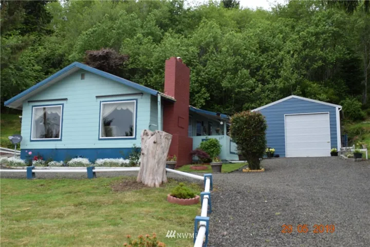 View of Home, garage and partial driveway from Monohon Landing Road.