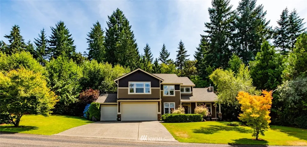 Pristine curb appeal with pretty landscaping