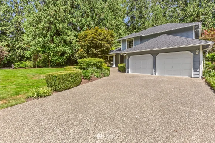 12621 182nd Ave SE, Snohomish is located in the highly desirable and established Lor-Brooke neighborhood and offers a large, private yard that is already equipped with the Invisible Fence!  Mature landscaping borders a spacious, grassy, open front yard and the home is set far back off the street down a long driveway.