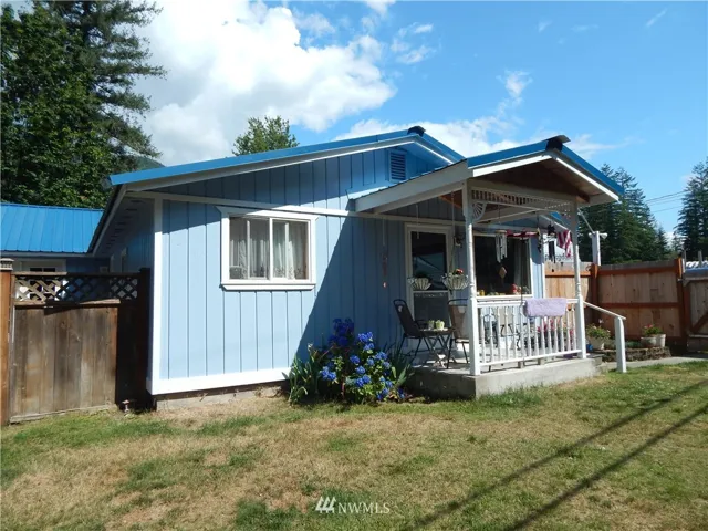 Front view of home with covered porch area.