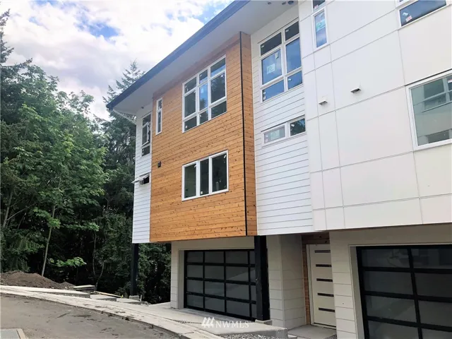 Picture is of previously completed homes in same development.