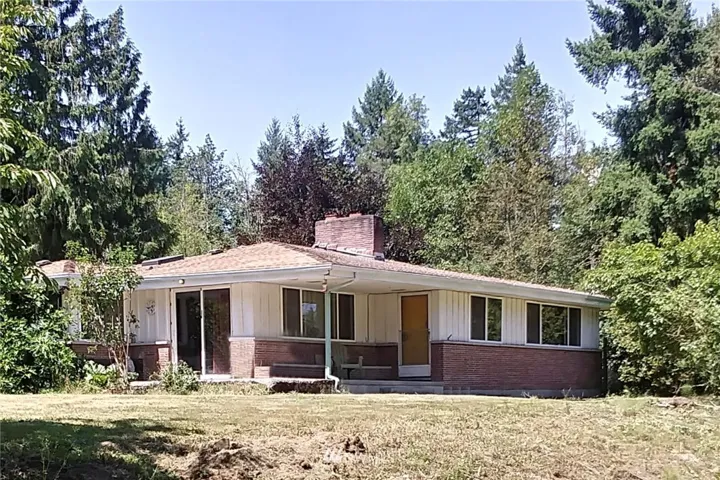 Welcome to this charming mid-century home, situated on a shy 1.5 acre, featuring over 3,500 finished sq ft. and a newer roof!
