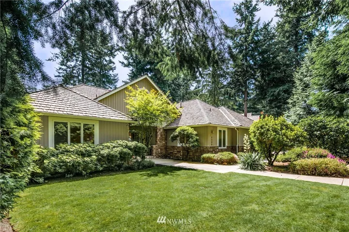 Mature evergreens provide privacy from the street.  A brand new roof was installed in 2017.