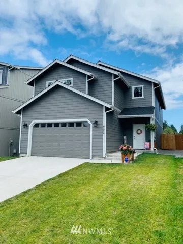 Lovely, yet easy care front yard and full sized garage situated at the end of a quiet cul-de-sac.
