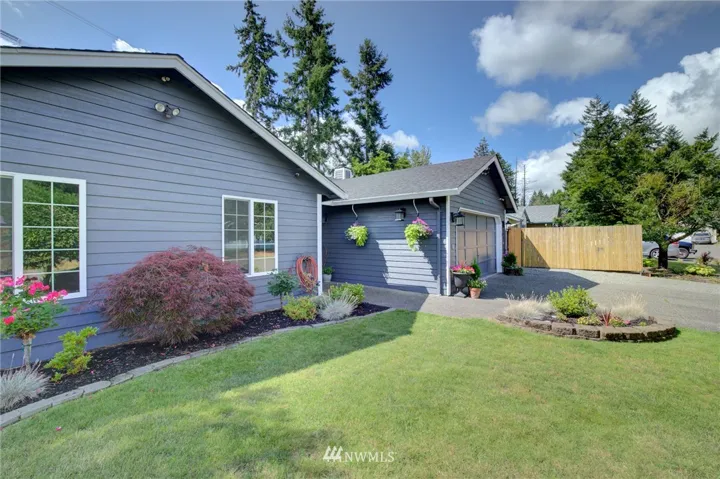 Spacious rambler on large flat lot.  2 car garage plus room to park an additional 5 cars.