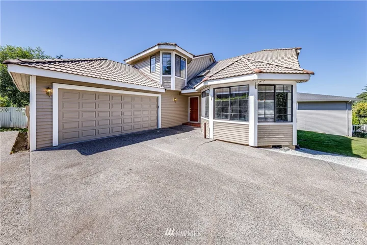 Gorgeous move-in ready home with stunning Sound & mountain views!