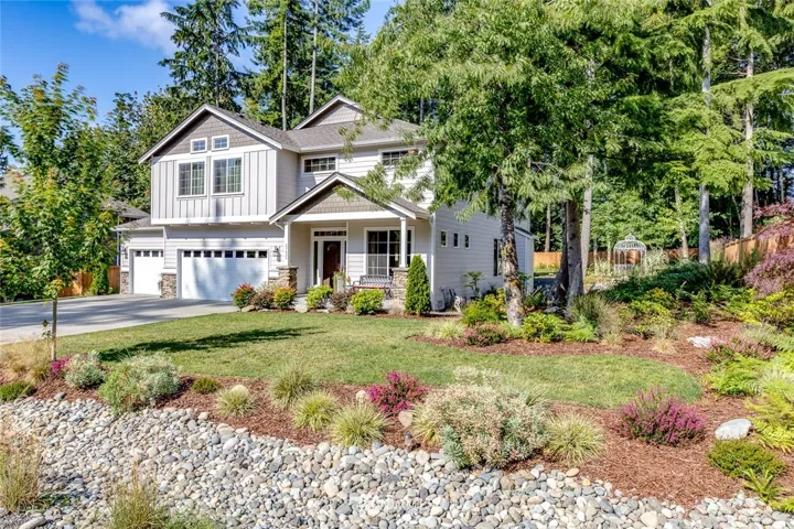 Beautiful Kingston home built in 2016 and like new!  It's located on .42 acres with Bloedel Reserve inspired landscaping and borders a greenbelt.