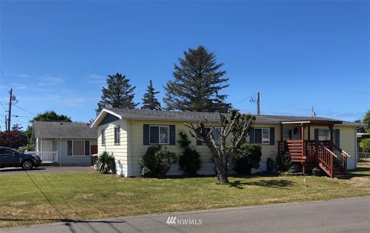 Great location on corner lot with paved driveway.