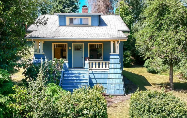 1913 Charm still shows in this early century Craftsman in the heart of Tukwila's residential historic area.  This home sits on .6 acre lot.  Now with a preliminary 3 lot short-plat it is ready for it's next best!  Renovate and restore or replace then build 2 new homes on the 2 back lots.