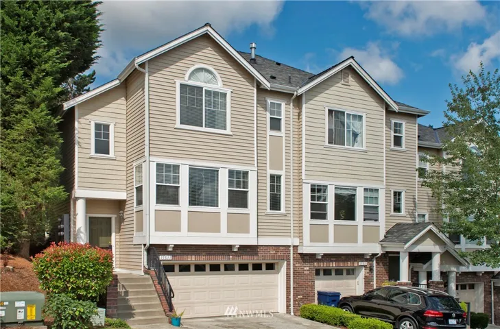 Welcome to this lovely 3 bedroom townhome near Woodinville wine country.   The front of the home faces East, so you have peaceful territorial views, with the occasional hot air balloon going by.  The home has an amazing amount of space!  Unlike most condominiums, this townhome unit has side by side parking in the attached garage for 2 cars plus so much space for all the toys you have or want!   And when guests come by, you can easily park two cars in the spacious driveway.   Some updates include the stone/tile surround on the fireplace, touchless faucet in kitchen for ease of cooking, light dimmers in areas of the home and a water spigot off the patio for watering your flower, vegetable and herb pots.  Other great features are air conditioning for these hotter days we are now seeing much more of, gas cooking for the chef, and gas water heater.  New roof and skylight installed last summer!