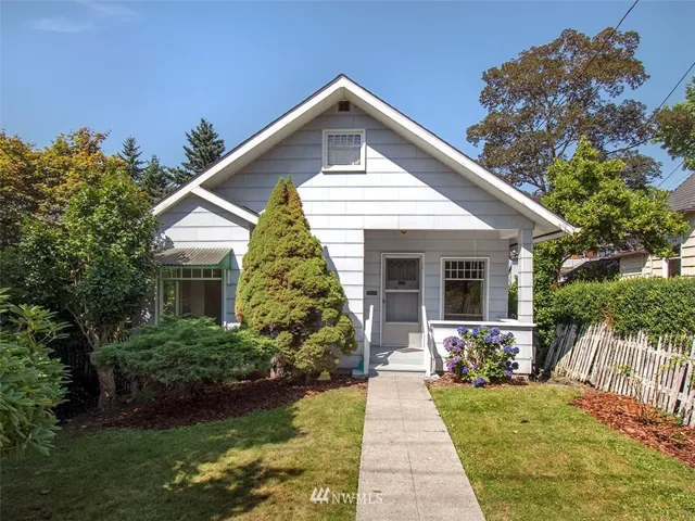 1901 charmer with a rocking chair front porch.