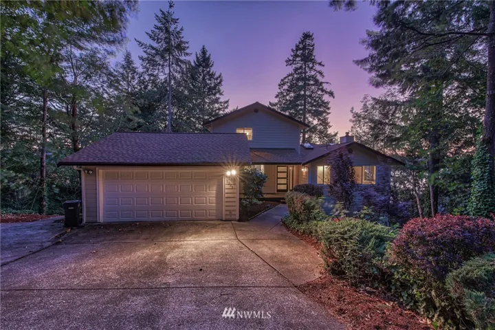 Contemporary design, well maintained, and mature landscaping.