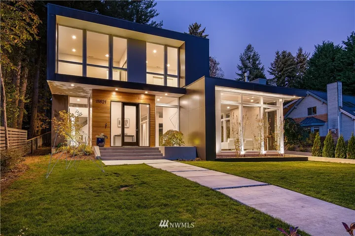 This modern home was designed by an award winning architect & builder. Beautifully appointed throughout.