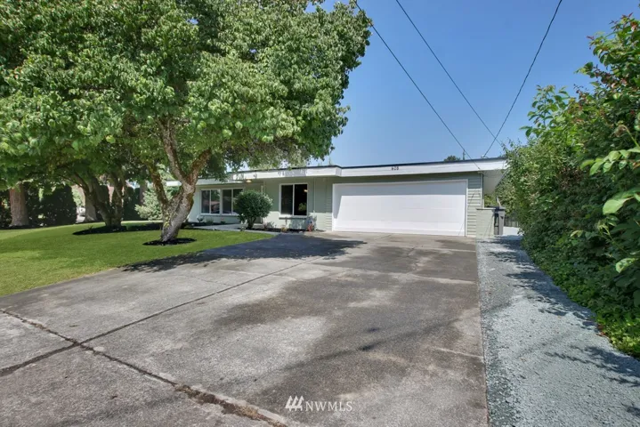 Mid-Century Charmer w/Attached 2-Car Garage. Much bigger than it appears!